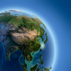 Fototapeta premium Earth with high relief, illuminated by the sun