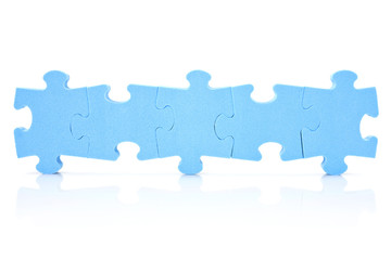 five puzzle pieces connected in a row