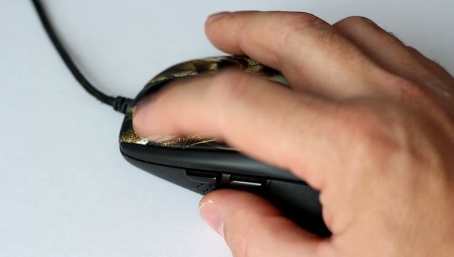 Man hand  using a computer mouse.