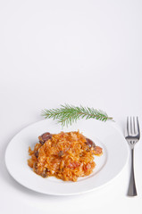 Sauerkraut auf polnische art mit geräuchertem Fleisch
