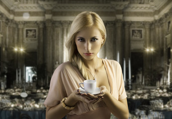 blond sensual woman with a coffee cup