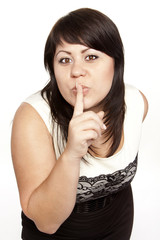 Naklejka premium Young pretty woman saying shh