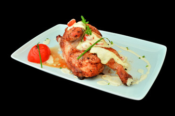 Chicken leg cooked in oven with white sauce