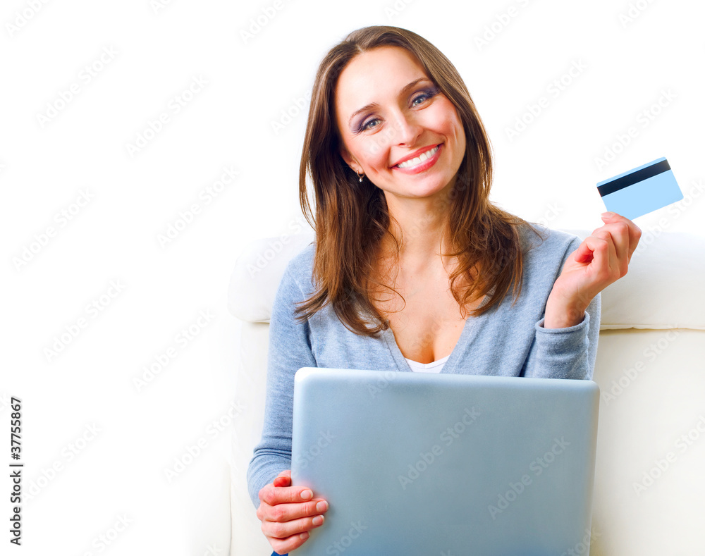 Wall mural smiling woman shopping online with credit card. e-shopping