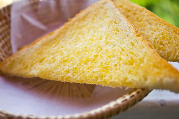 Buttered toast in a basket.