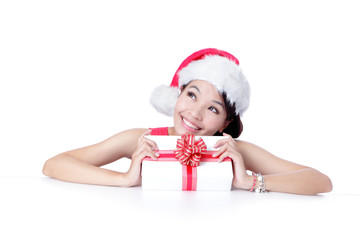 Beautiful Christmas Girl happy holding gift