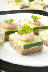 Prawn cocktail appetizer with cottage cheese and cucumber