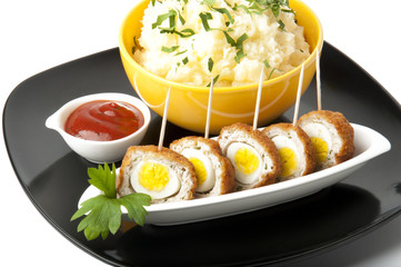 meatballs with quail eggs and potatoes
