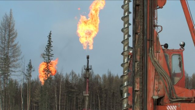 Torches oil and gas field