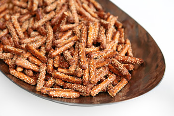 Crispy straw (sticks) on white background