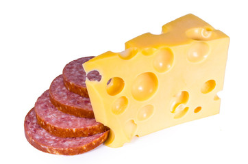 Swiss cheese with holes of a salami slices