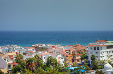 Fototapeta na wymiar Shoreline of Atlantic ocean, cityscape view of Tenerife island.
