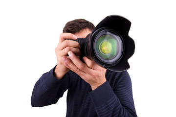 Professional photographer with camera on white background