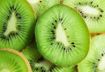 Photo sur Aluminium Tranches de fruits tranches de kiwi