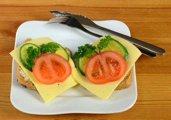 Ready breakfast breads on the table background