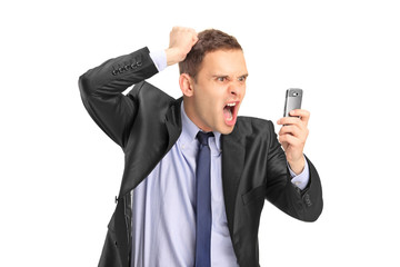 Businessperson screaming on a mobile phone