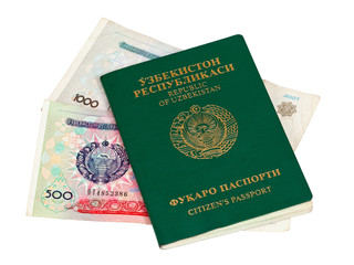 Fototapeta premium Uzbekistan passport and money isolated on white background