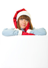 woman in Santa Claus clothes leaning on blank board