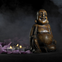 Buddha sculpture in dark back