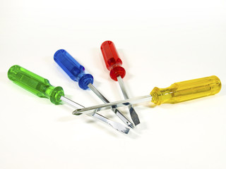 Colorful screwdrivers on white background