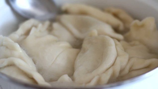 The national dish of Russia  dumplings, cooked in a pan.