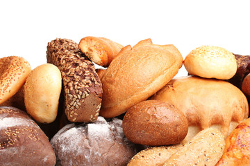 tasty breads and rolls isolated on white