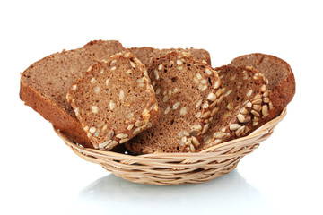 delicious sliced ​​rye bread in  wicker basket isolated on white
