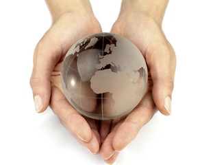 Glass globe in hands