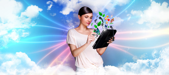 Young pretty woman using her universal device