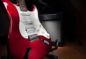 red and white electric guitar