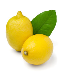 two lemons with a leaf against white background