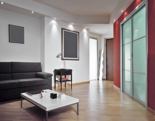 ingresso affacciato su un moderno soggiorno con parquet