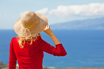 lady in red with hat