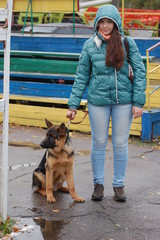 girl shows her dog at the Kiev Regional exhibition of dogs