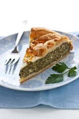 Cake with spinach, herbs and cheese