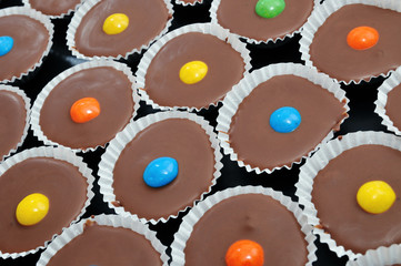 Chocolate cakes with colored candy