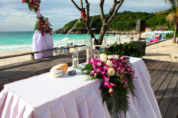 Fototapeta na wymiar wedding venue set-up at the beach.