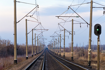 Fototapeta na wymiar The railway in steppes, a train