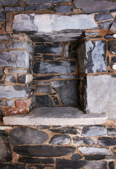 Fototapeta na wymiar Niche in a stone wall