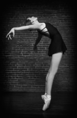 Ballerina on Grunge Brick Background