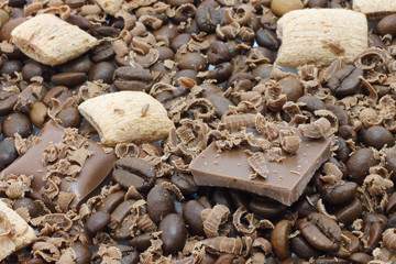 Chocolate pieces and coffee beans for background