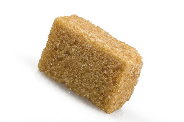 brown lump cane sugar cubes close up