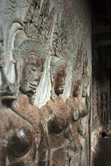 Fototapeta premium Carvings of devata goddess from the central tower of Angkor Wat, Angkor, Siem Reap, Cambodia, Asia