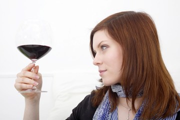 young woman with red wine