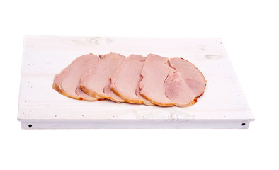 Cutting of boiled pork on white wooden board, isolated