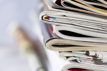 stack of magazines isolated on white