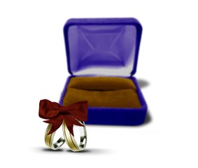 rings with red ribbon