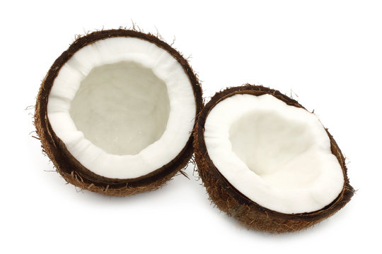 Cut coconut on white background