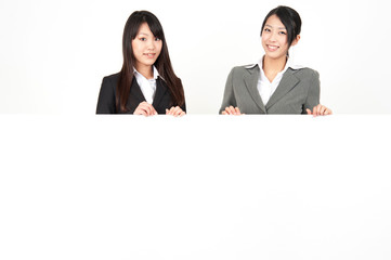 asian businesswomen with blank whiteboard