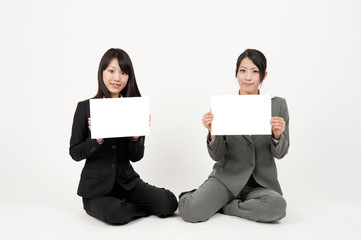 asian businesswomen with blank whiteboard